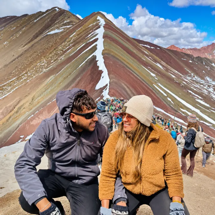 A Shared Moment at Rainbow Mountain