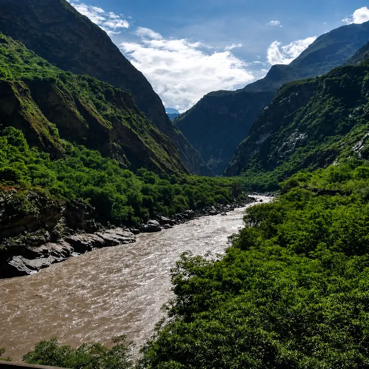 River flowing through the steep mountain valley along the Choquequirao Trek.